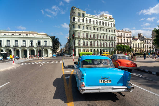 Classic car used as a taxi at a traffic light in Old Havana. Havana. Cuba. January 10, 2020.
