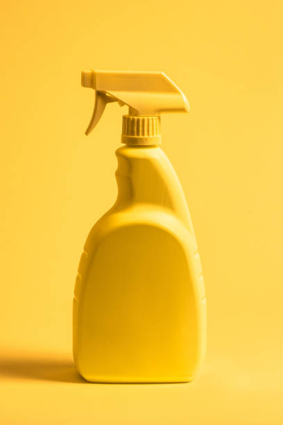 istock Disinfectant Cleanser in a Yellow Opaque Spray Bottle 1215033232