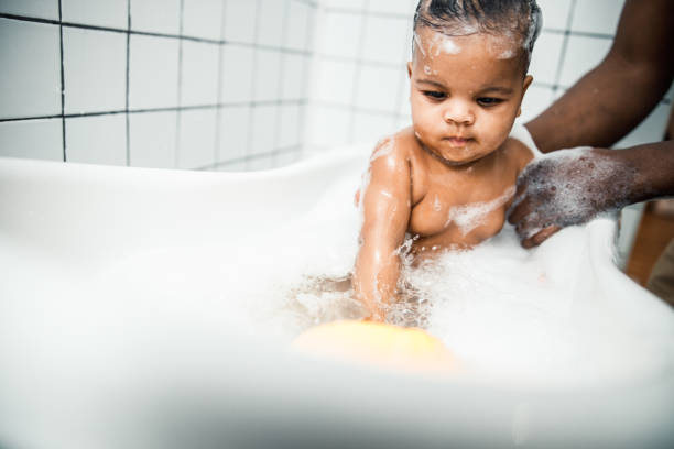 istock Adorable toddler baby taking bath in bathroom 1215033450