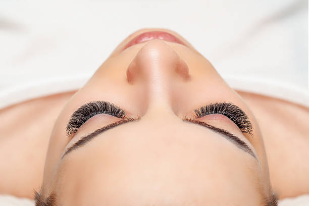 istock Woman Eyes with Long Eyelashes Extension. Lashes. 1215041206