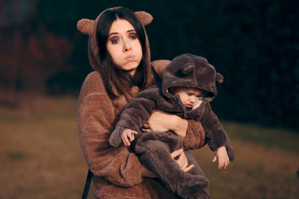 istock Stressed Mom and Cute Daughter Wearing Matching Outfits 1215041385