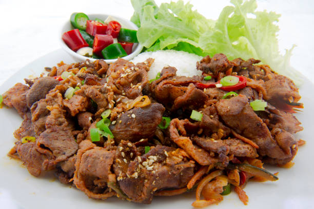 Stir fried with pork and vegetables sprinkle sesame seeds