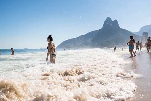 People enjoy sun and sea at famous Ipanema Beach in Rio de Janeiro, Brazil. (March 9, 2019)