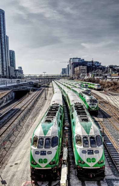 Go trains stopping at a Railway station at sunny day stock photo