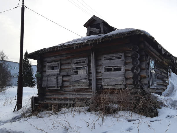 istock Vintage Damaged Abandoned Wooden Building 1215045339