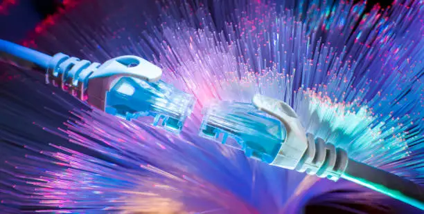 Photo of network cables with fiber optical technology background,Communication Concept