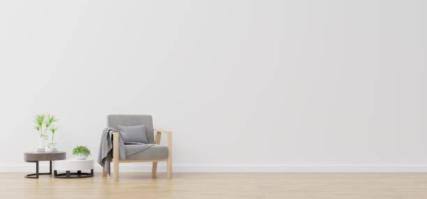 istock White wall with armchair in living room. 1215051261