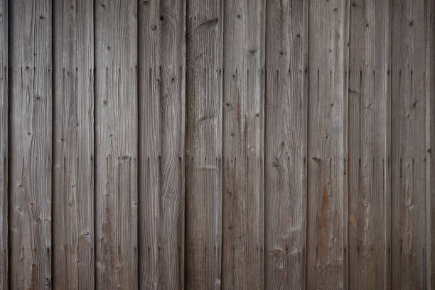 istock Surface bright brown wooden wall, texture of decorative old wood striped, Rustic style wallpaper. Timber texture, 1215051914