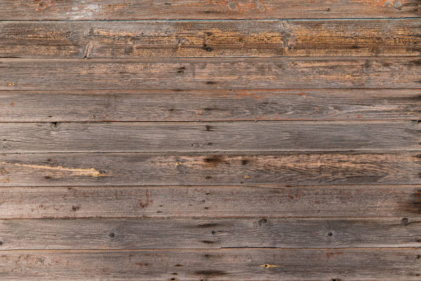 istock Wooden slats spoiled by the wind and sun. 1215052583