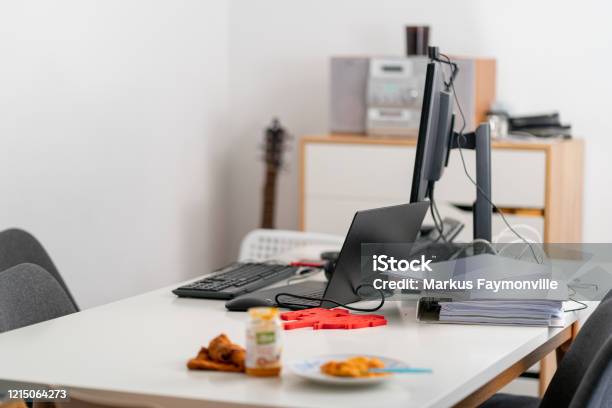 Dining Table With Adhoc Home Office Laptop Computer Setup Stock Photo - Download Image Now
