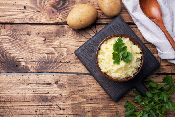 istock Homemade cream mashed potatoes in a dish with parsley. copy space 1215066188
