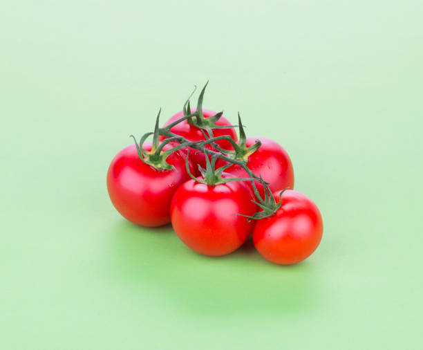 istock Cluster of cherry tomatoes. 1215068060
