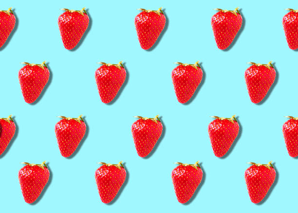 istock Seamless pattern of ripe strawberry berries blue background. Flat lay top view. 1215072200