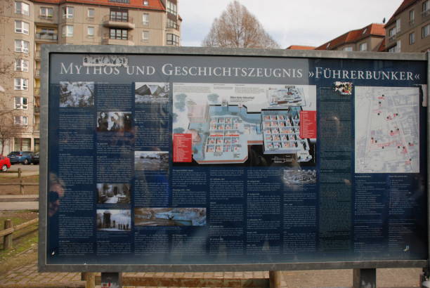 this sign marks the location of hitler's bunker during his final days during world war ii in berlin, germany - adolf hitler imagens e fotografias de stock