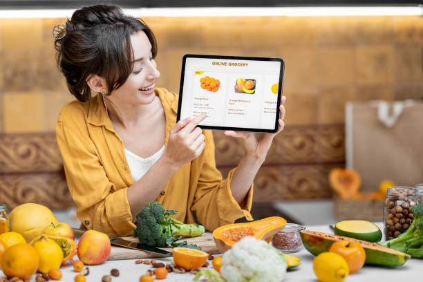 istock Woman shopping online using digital tablet 1215073400