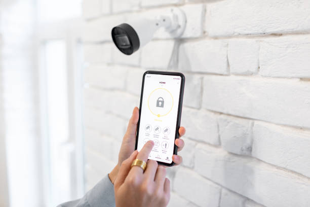 istock Controlling video surveillance with a smart phone 1215080697