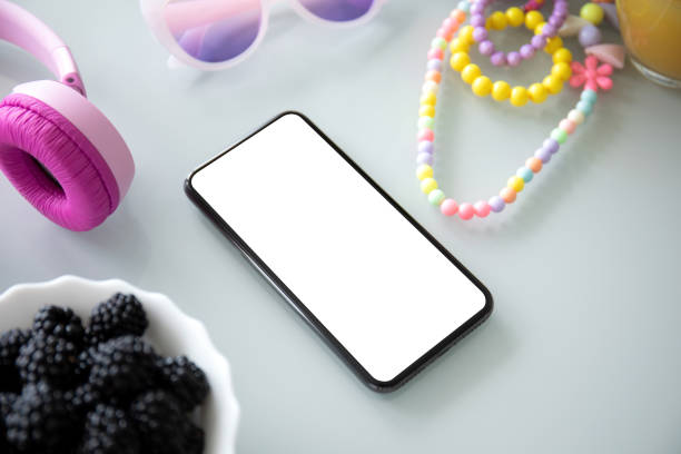 phone with isolated screen on a girl desk