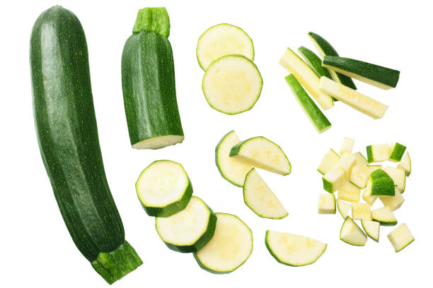 fresh green zucchini slices isolated on white background - zucchini imagens e fotografias de stock