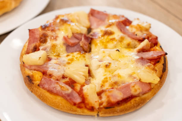 istock Pizza Hawaiian with pineapple and ham 1215086013