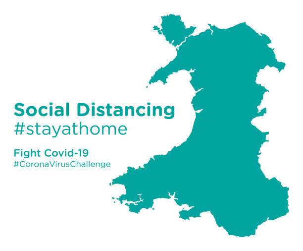 mapa walii z tagiem social distancing stayathome - wales stock illustrations