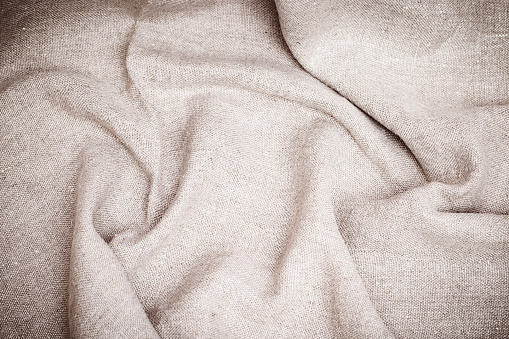 Rough Texture Of Linen Cloth Closeup Canvas Is Made Of Natural Ingredients  Crumpled Cotton Beige Fabric Creases On Fabric Stock Photo - Download Image  Now - iStock