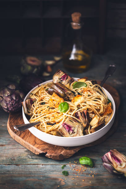 istock Spaghetti with Artichoke and Lemon Sauce 1215087223
