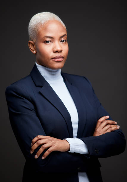 Young African American businesswoman portrait looking at camera. Lifestyle coffee shop made in Barcelona.
Young African American businesswoman portrait with arms crossed over chest. turtleneck photos stock pictures, royalty-free photos & images