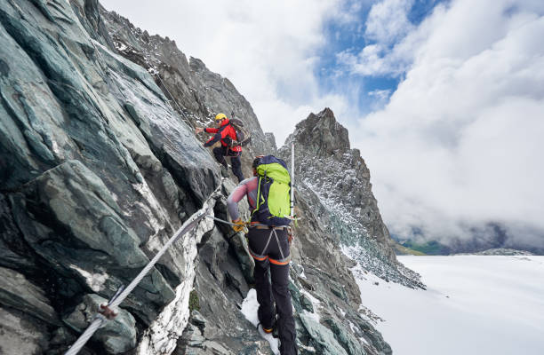 istock Alpinists climbing Grossglockner mountain, Austria. 1215088764