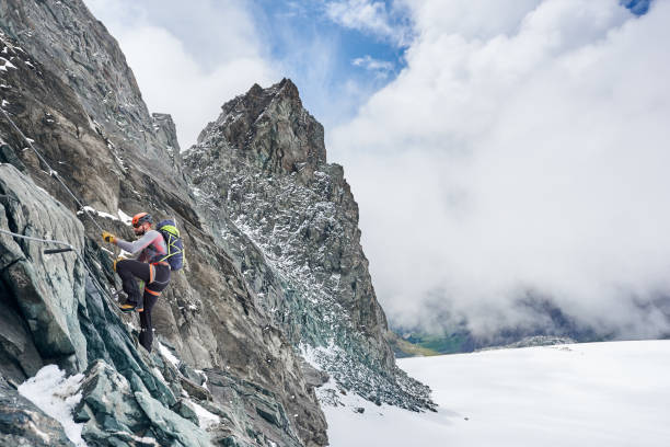 istock Mountaineer climbing Grossglockner mountain, Austria. 1215088770