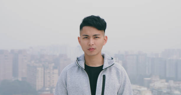 istock asian man look to you 1215088916
