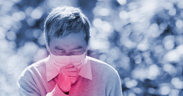 istock old man cough outdoor 1215089595