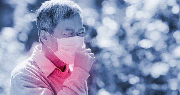 istock old man wear face mask 1215089655