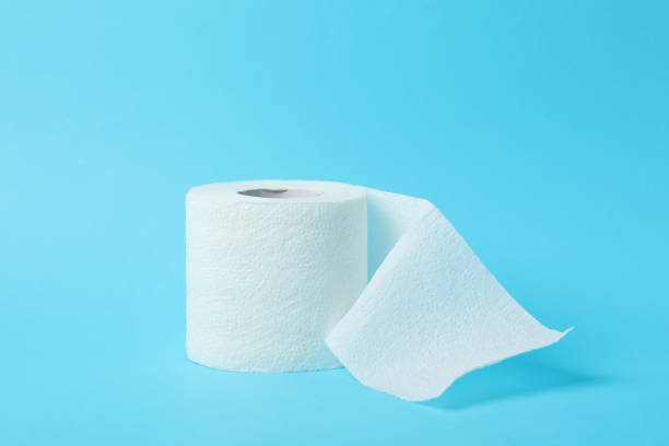 istock Toilet paper on blue background, space for text 1215089775
