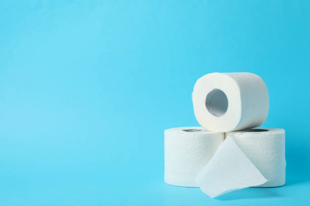 istock Toilet paper on blue background, space for text 1215089835