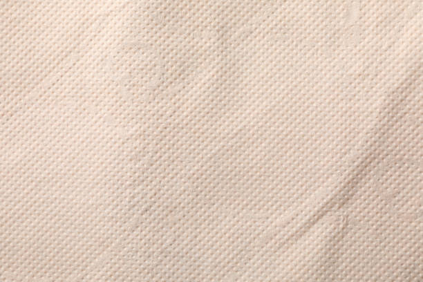 istock Toilet paper texture on whole background, close up 1215090134