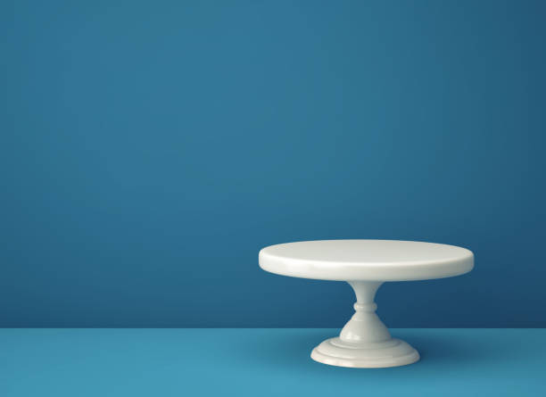 istock Porcelain cake stand on blue backgroung 1215091243