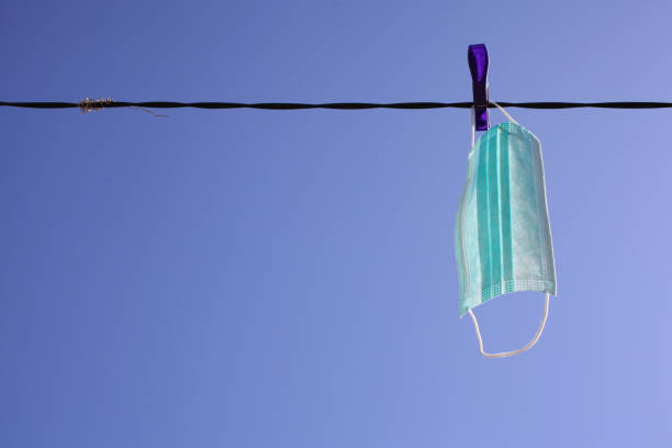 istock Drying surgical mask outdoor 1215093739
