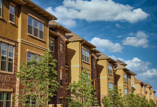istock Brick and Stucco Condos in Morning Light 1215093919