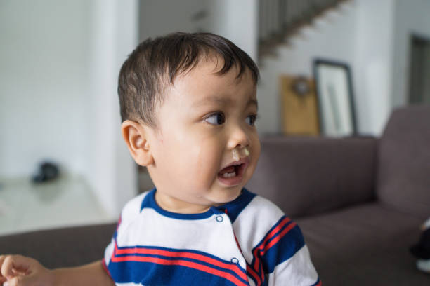 istock Baby Boy with Snotty Nose 1215095076