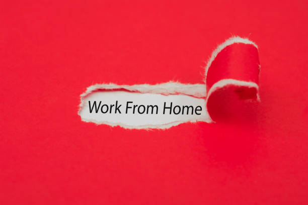 istock Torn red paper revealing the word work from home. Upcoming events concept. 1215096414