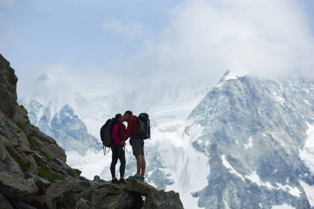 istock Couple traveling in mountains scenery. 1215108381