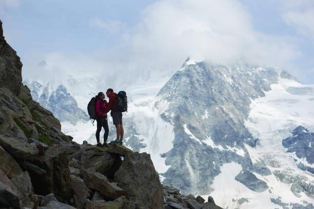 istock Couple traveling in mountains scenery. 1215108428