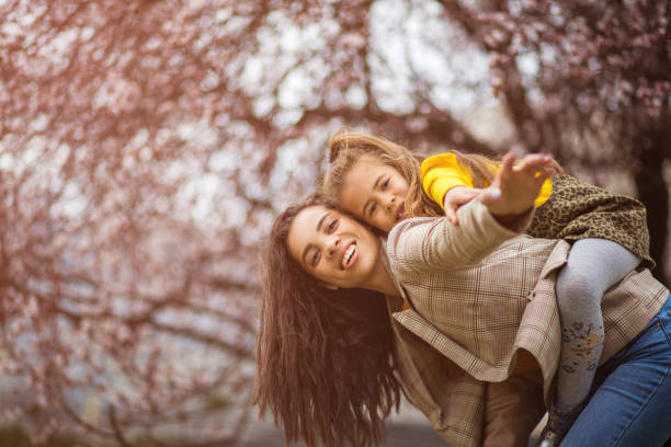 istock You're always safe on your mother's back. 1215108553