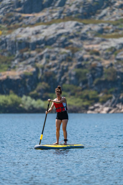 istock Stand up paddle on a lake 1215110854