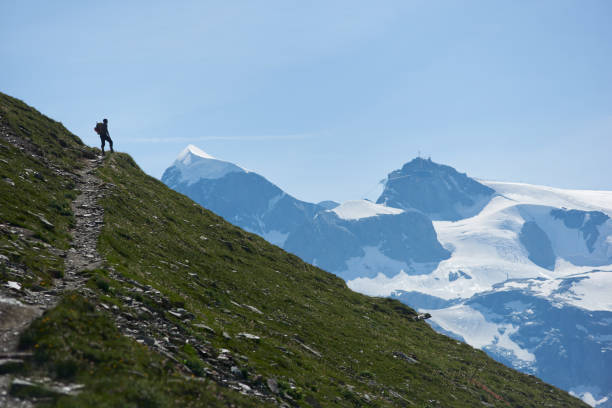 istock Tourist enjoying mountain scenery. 1215113127