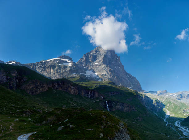 istock Scenery of snowy summer mountains. 1215114020