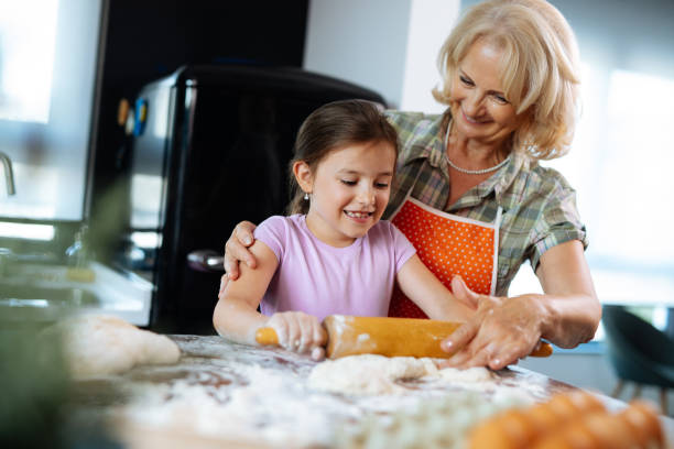 istock Making cookies with grandma 1215114661