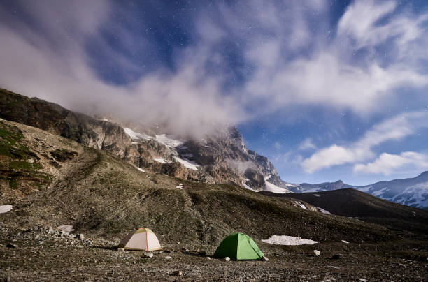 istock Scenery of mountains and starry night sky. 1215115034