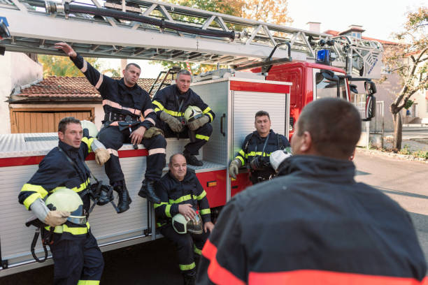 istock Firefighters team getting instructions from their chief officer 1215116758
