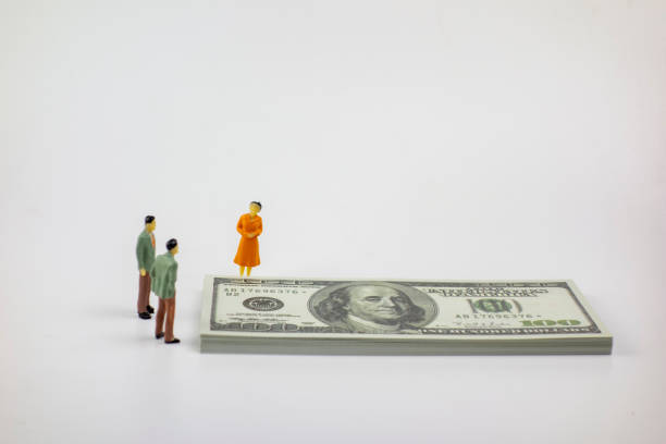 istock People and cash on a white background 1215119330